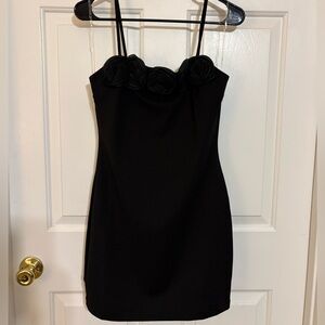 Elegant Black Dress with Floral Detail
